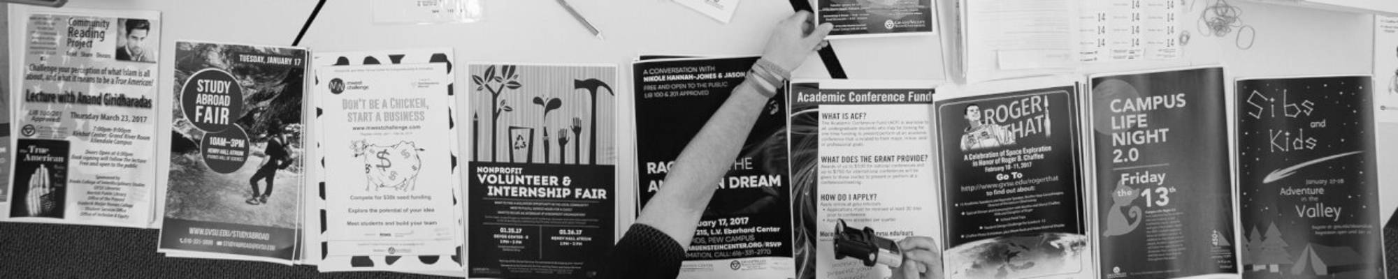 Posters being stamped for posting